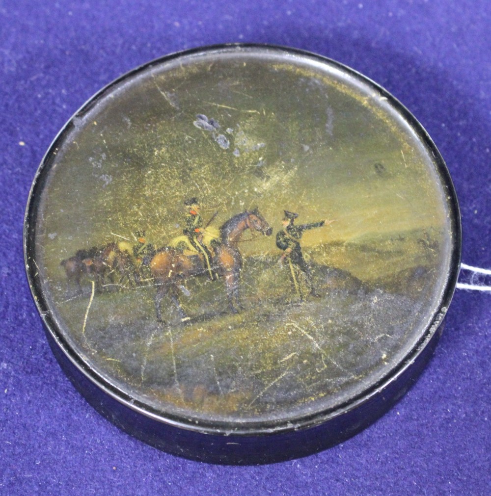 A Stobwasser style papier mache snuff box decorated with an Officer of the 14th Kings Light Dragoons on piquet at Fracadas in Spain, si